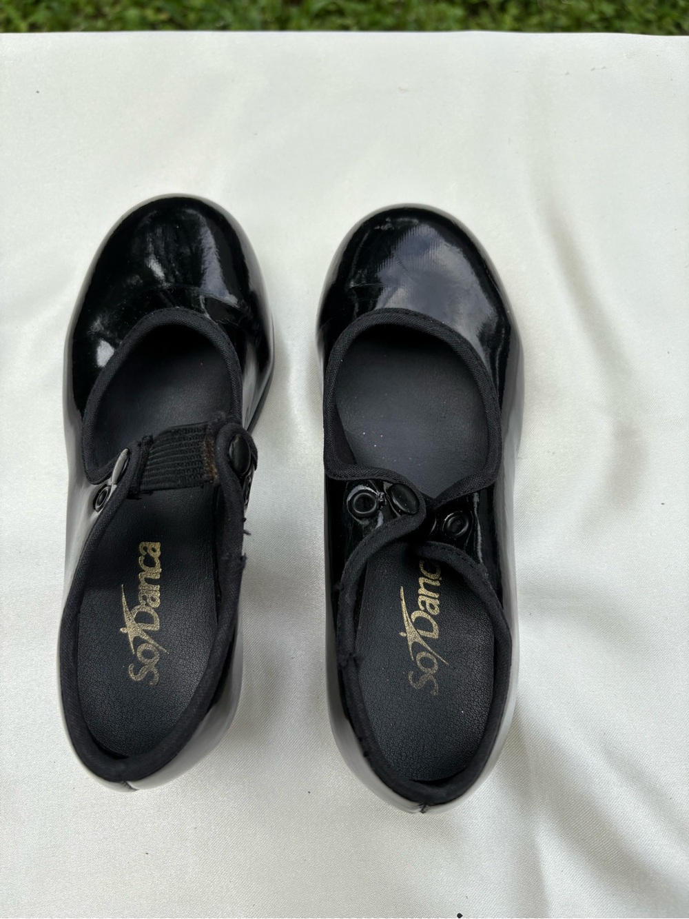 Girls black patent tap shoes by So Dance. Preowned